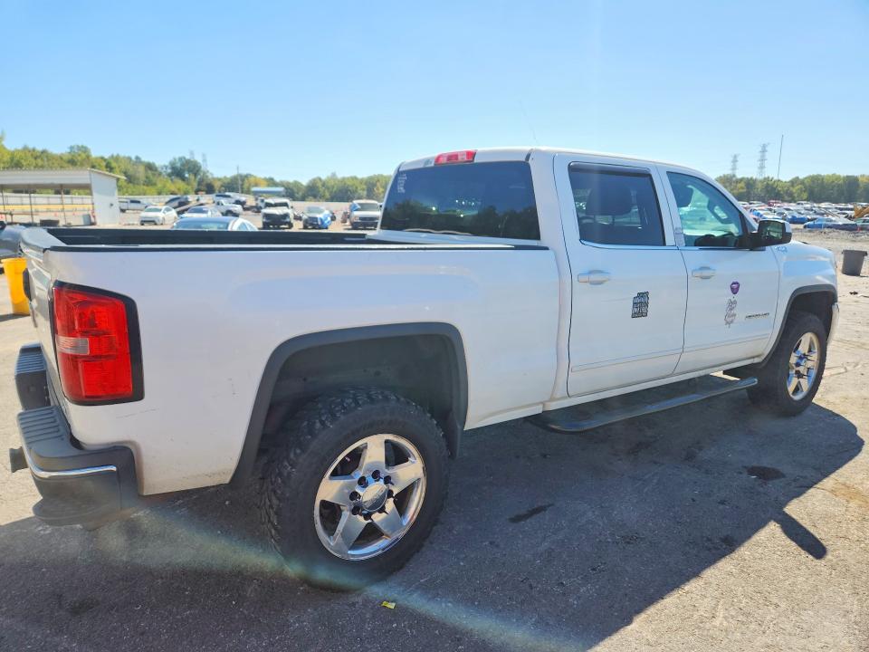 Снимка 3 от търг – 2015 GMC SIERRA с VIN 1GT12YEG9FF130982