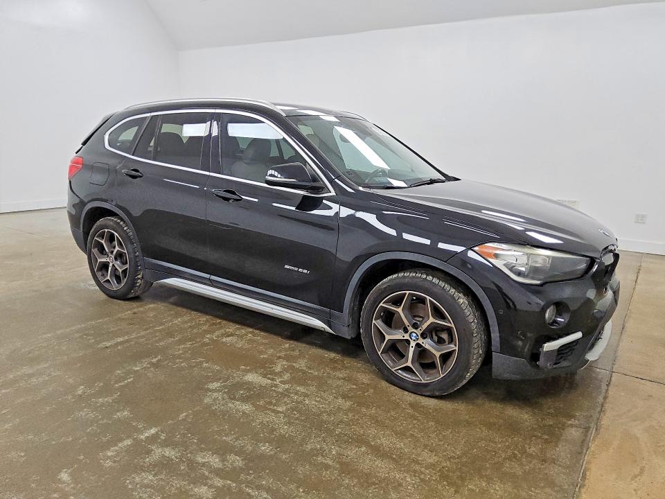 Снимка 4 от търг – 2018 BMW X1 с VIN WBXHU7C3XJ5H45158