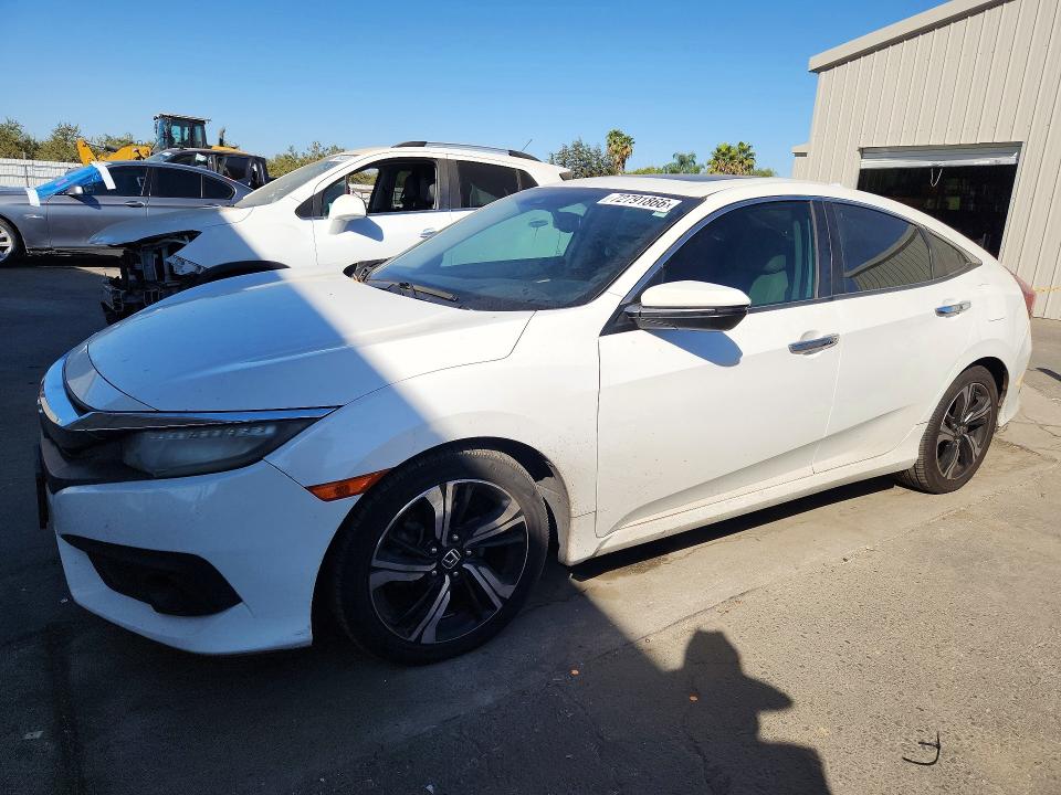 HONDA CIVIC 2016 with VIN 19XFC1F93GE219694 - Photo from auction