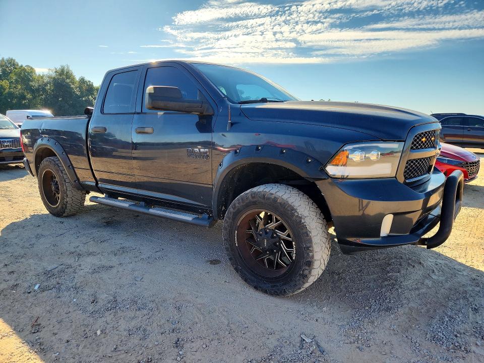 Снимка 4 от търг – 2014 RAM 1500 с VIN 1C6RR6FT5ES311007