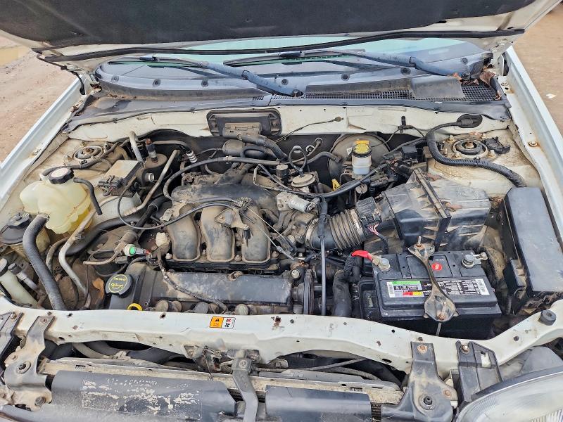 Снимка 11 от търг – 2003 FORD ESCAPE с VIN 1FMYU93183KC05473