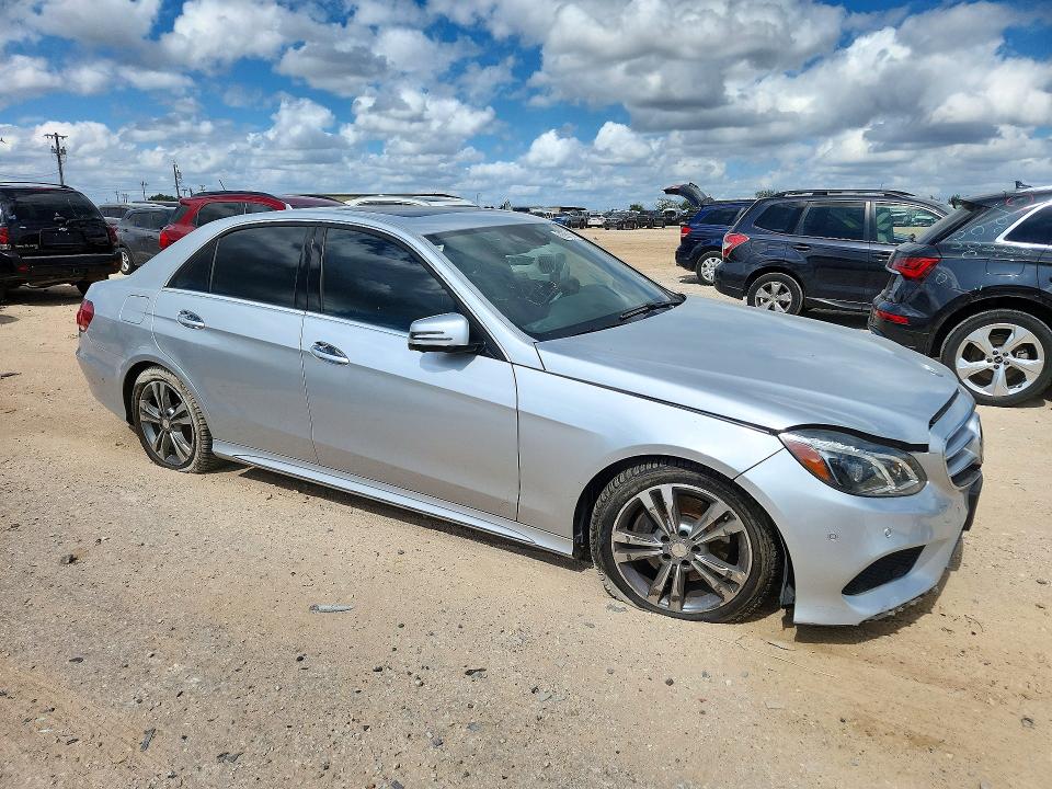 Снимка 4 от търг – 2015 MERCEDES-BENZ E с VIN WDDHF0EB0FB093133