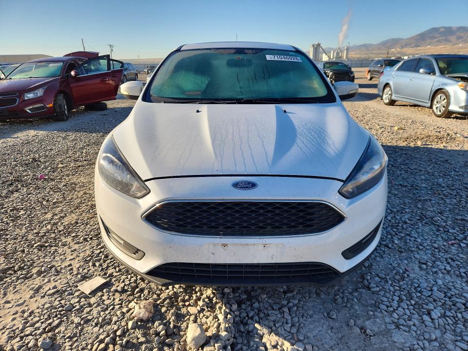 Foto 5 de la subasta – 2017 FORD FOCUS con VIN 1FADP3M2XHL314247