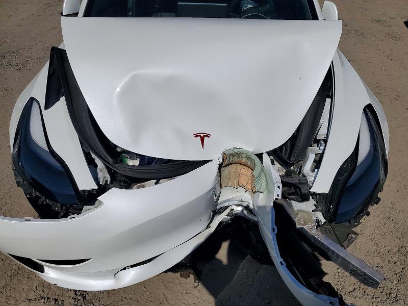 Снимка 11 от търг – 2023 TESLA MODEL 3 с VIN 5YJ3E1EA7PF501033