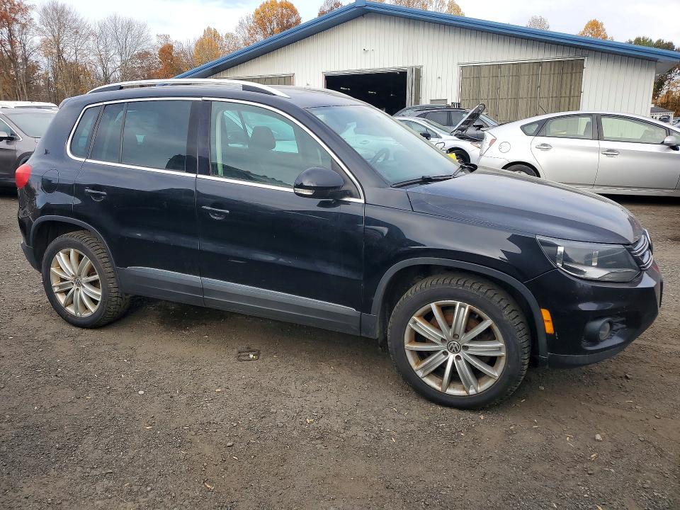 Снимка 4 от търг – 2013 VOLKSWAGEN TIGUAN с VIN WVGBV3AX5DW562482