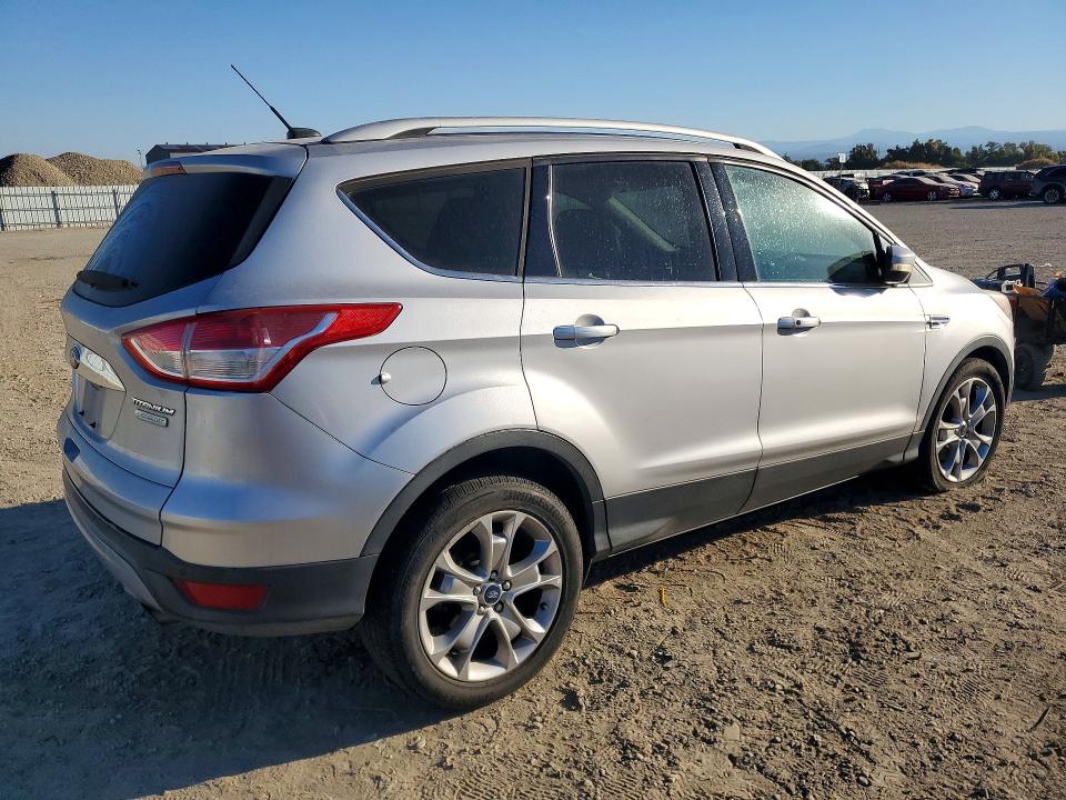Photo 3 from auction – 2014 FORD ESCAPE with VIN 1FMCU0J93EUB47231
