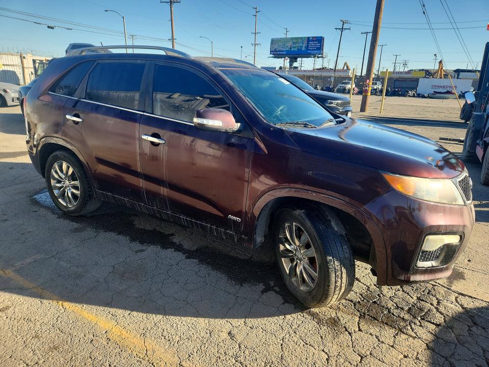 Photo 4 from auction – 2012 KIA SORENTO with VIN 5XYKWDA29CG279400