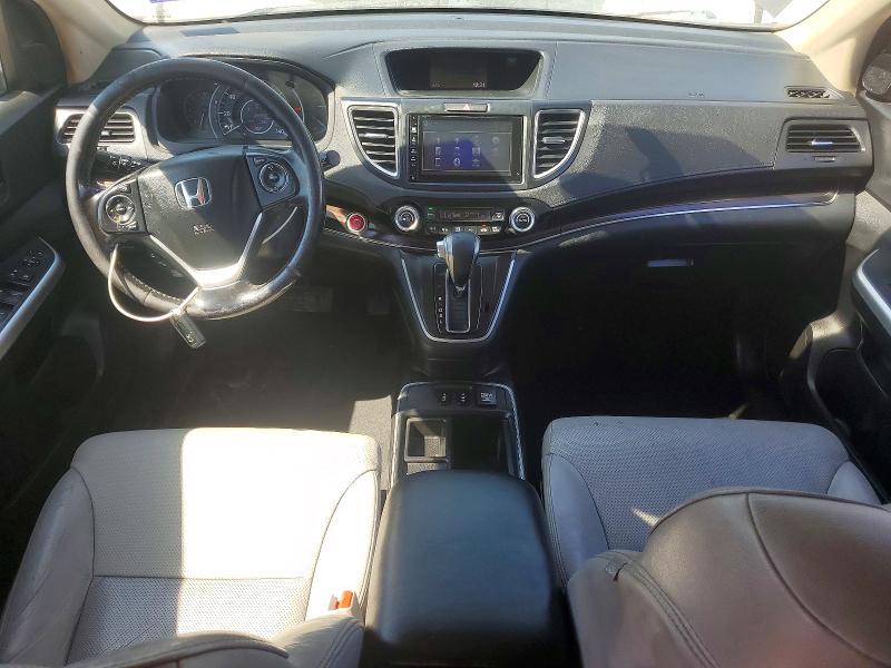 Photo 8 from auction – 2016 HONDA CR-V with VIN 2HKRM4H71GH665801