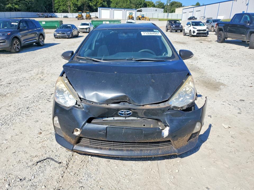 Photo 5 from auction – 2014 TOYOTA PRIUS C with VIN JTDKDTB33E1067750