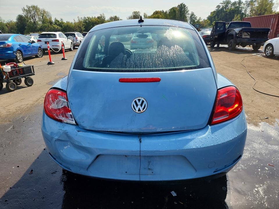 Photo 6 from auction – 2014 VOLKSWAGEN BEETLE with VIN 3VWJ17AT3EM666421