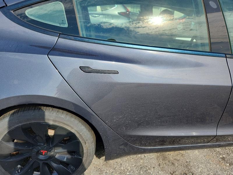 Снимка 10 от търг – 2021 TESLA MODEL 3 с VIN 5YJ3E1EA1MF026815
