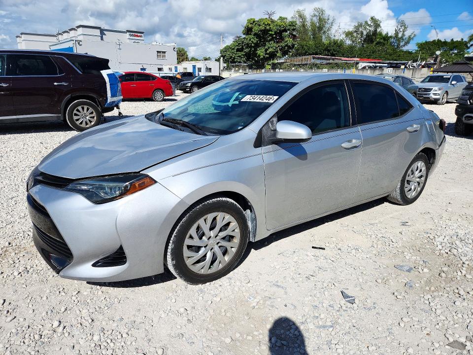 TOYOTA COROLLA 2019 with VIN 5YFBURHE8KP869570 - Photo from auction