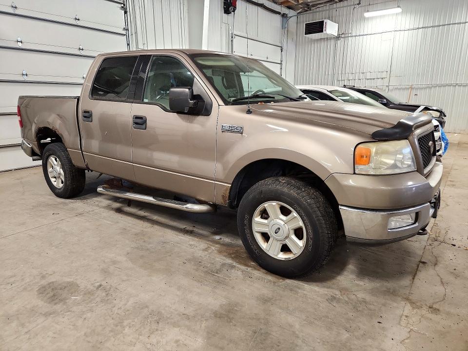 Снимка 4 от търг – 2004 FORD F150 с VIN 1FTRW14W04KB94369