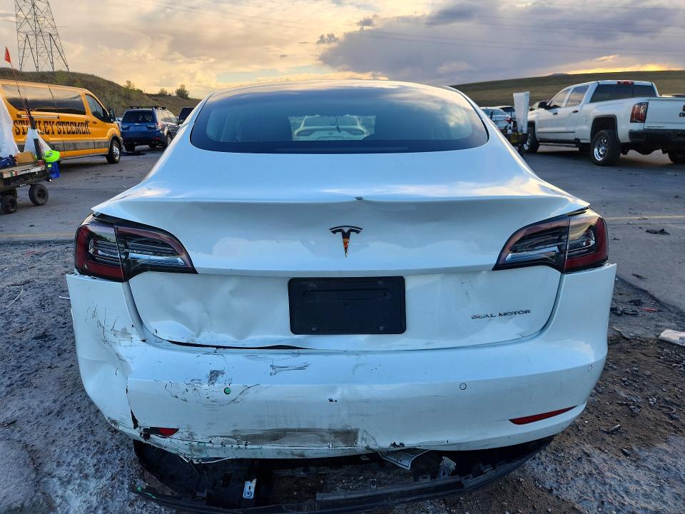 Снимка 6 от търг – 2022 TESLA MODEL 3 с VIN 5YJ3E1EB7NF240749