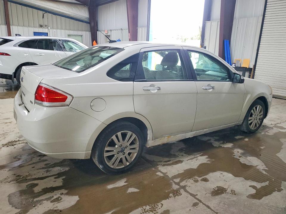 Photo 3 from auction – 2011 FORD FOCUS with VIN 1FAHP3HN7BW161385