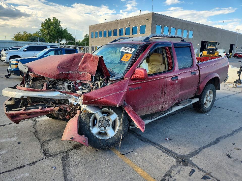 NISSAN FRONTIER 2000 с VIN 1N6ED27Y7YC410609 - Снимка от търг
