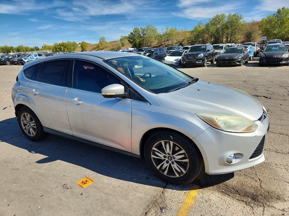 Снимка 4 от търг – 2012 FORD FOCUS с VIN 1FAHP3M20CL316891