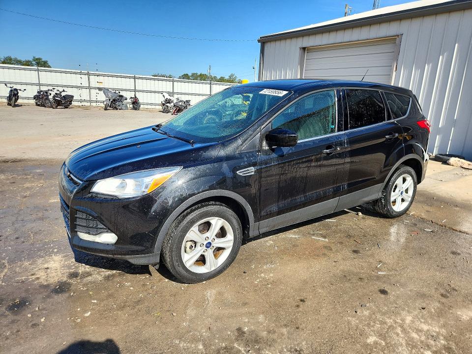 FORD ESCAPE 2014 with VIN 1FMCU9GX9EUC03053 - Photo from auction