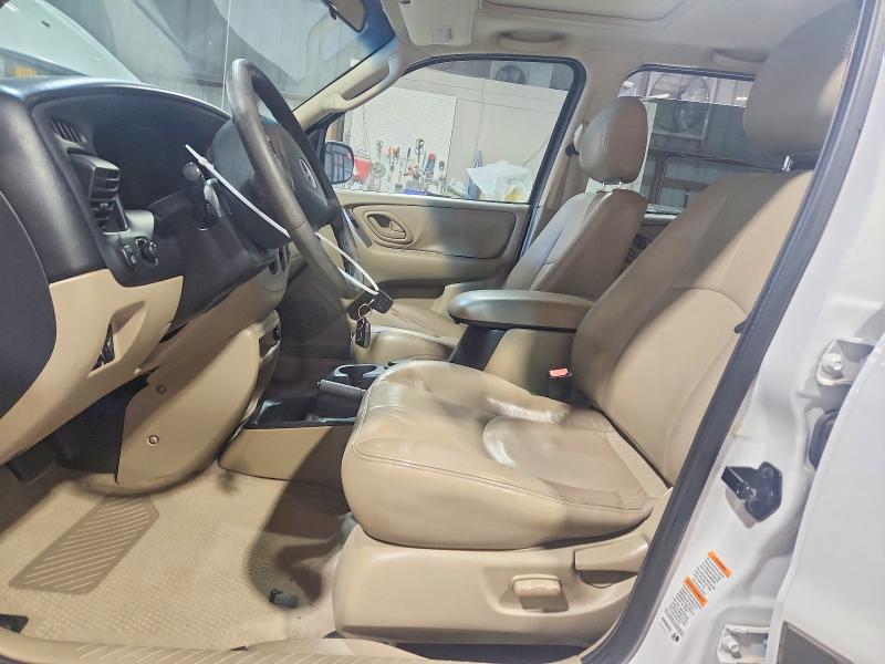 Снимка 7 от търг – 2003 MAZDA TRIBUTE с VIN 4F2CZ96163KM19129