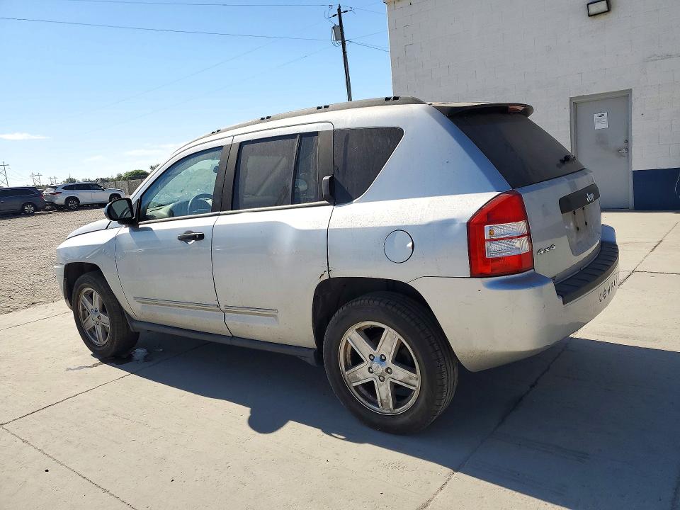 Фото 2 с аукциона – 2009 JEEP COMPASS с VIN 1J4FF47B79D210456