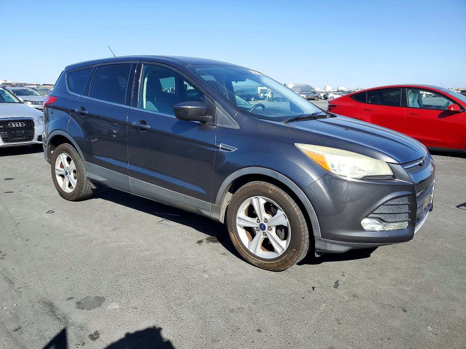 Photo 4 from auction – 2015 FORD ESCAPE with VIN 1FMCU0GX2FUA43952