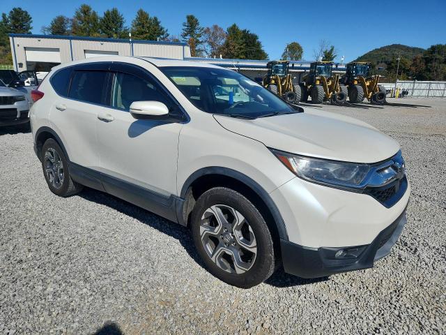 Photo 4 from auction – 2017 HONDA CR-V with VIN 2HKRW2H55HH681272