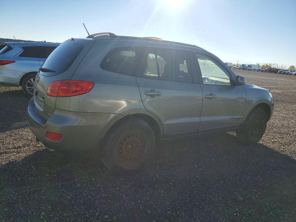 Снимка 3 от търг – 2009 HYUNDAI SANTA FE с VIN 5NMSG13E89H318429