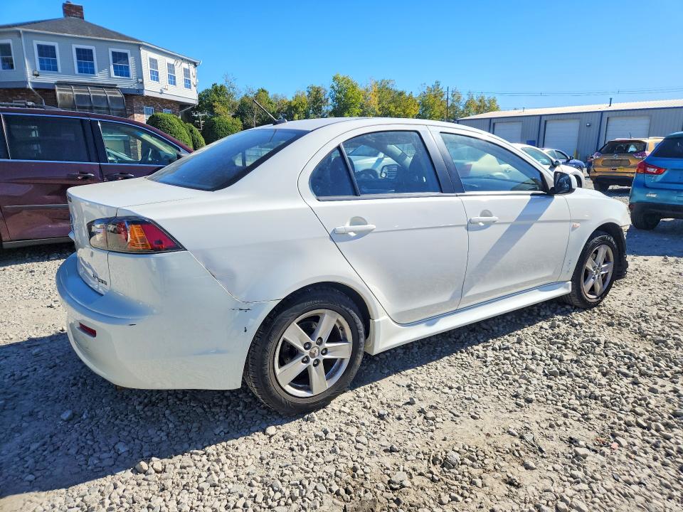 Photo 3 from auction – 2014 MITSUBISHI LANCER with VIN JA32V2FW3EU009565