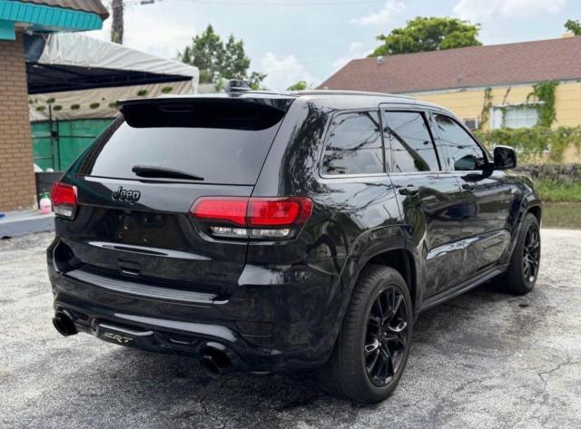 Снимка 4 от търг – 2014 JEEP GRAND CHEROKEE с VIN 1C4RJFDJ9EC555495