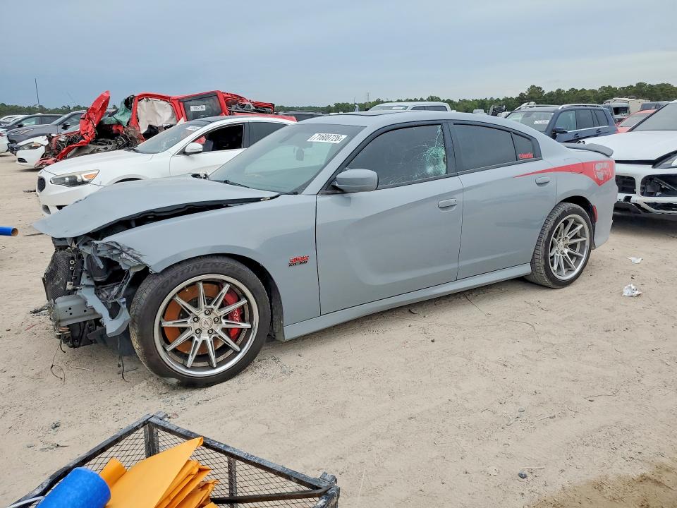 DODGE CHARGER 2021 with VIN 2C3CDXGJXMH634978 - Photo from auction