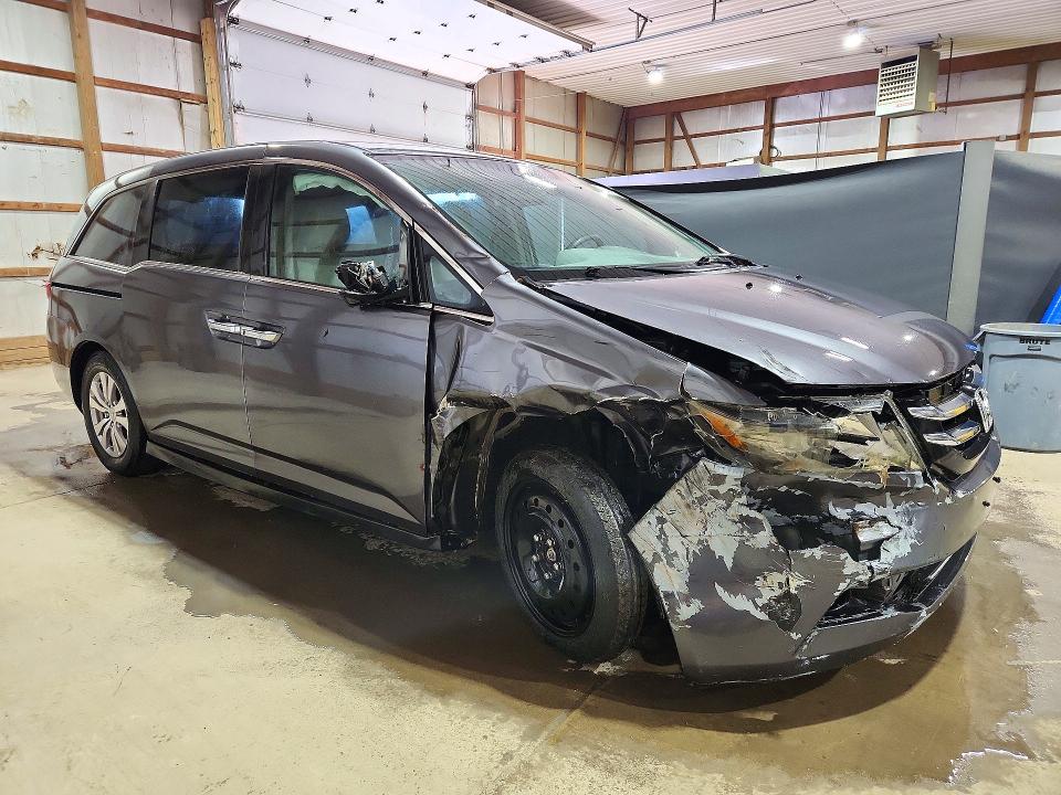 Photo 4 from auction – 2016 HONDA ODYSSEY with VIN 5FNRL5H44GB155259