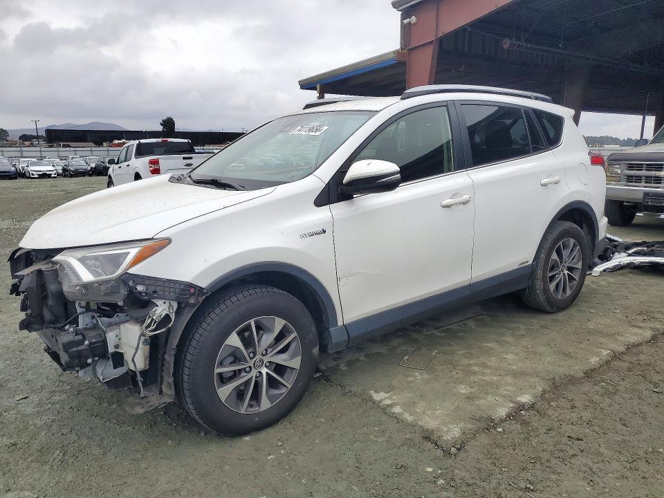 TOYOTA RAV4 HYBRID 2018 с VIN JTMRJREV9JD197726 - Снимка от търг