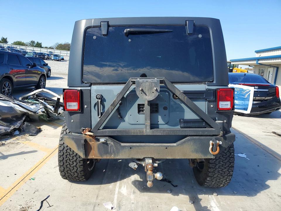 Снимка 6 от търг – 2015 JEEP WRANGLER UNLIMITED с VIN 1C4BJWDG3FL619019