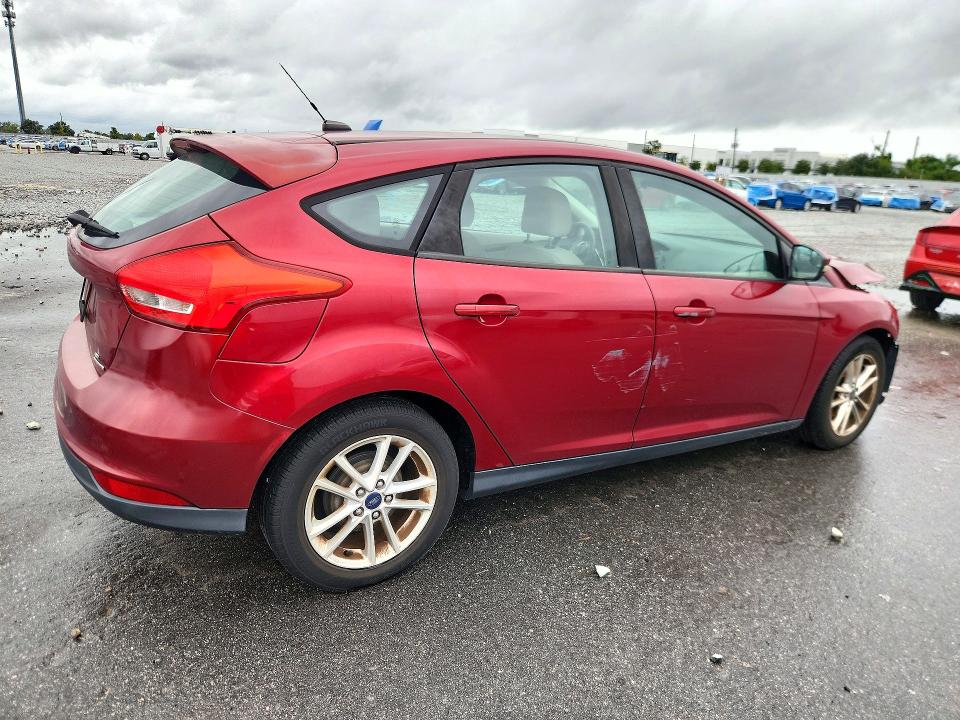Foto 3 de la subasta – 2016 FORD FOCUS con VIN 1FADP3K2XGL350313