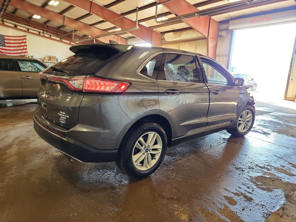 Photo 3 from auction – 2016 FORD EDGE with VIN 2FMPK4J94GBC51380