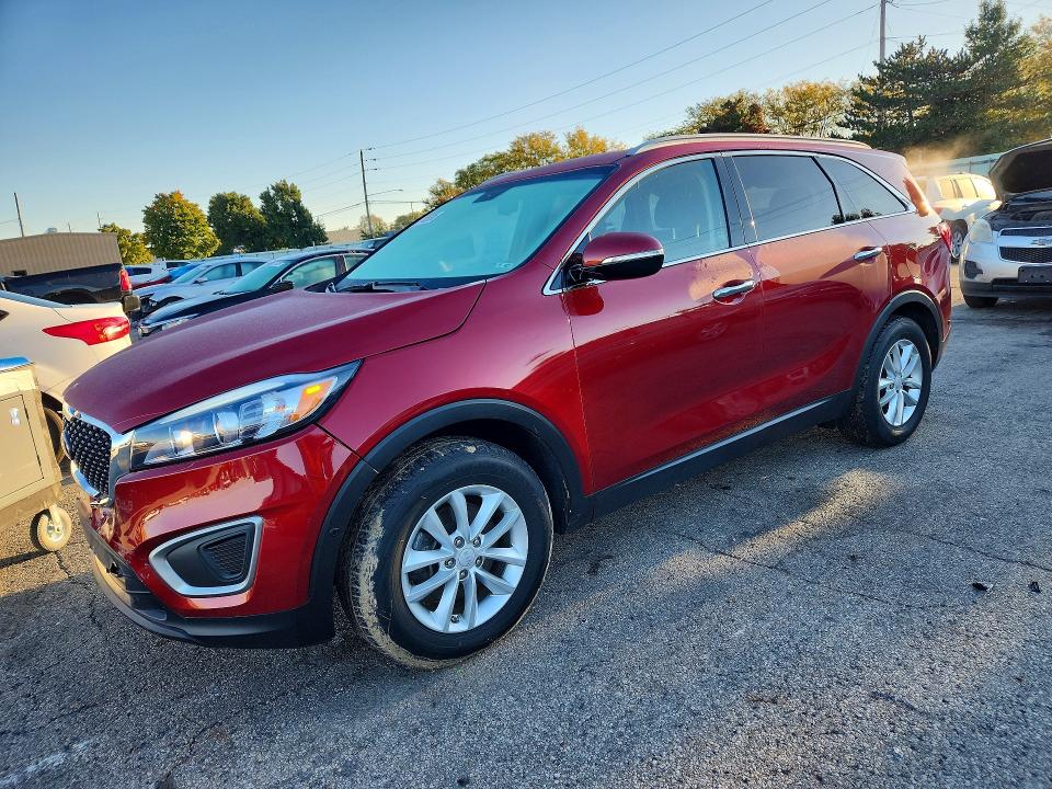 KIA SORENTO 2018 with VIN 5XYPG4A31JG425135 - Photo from auction