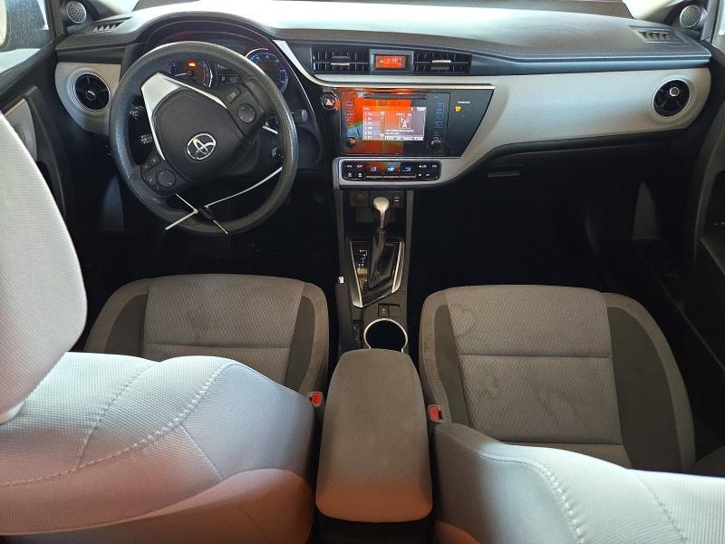 Снимка 8 от търг – 2017 TOYOTA COROLLA с VIN 5YFBURHE0HP734608