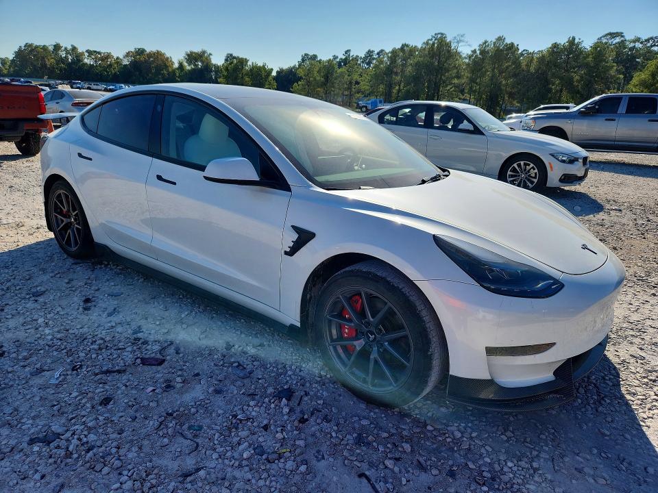 Снимка 4 от търг – 2023 TESLA MODEL 3 с VIN 5YJ3E1EA2PF653561