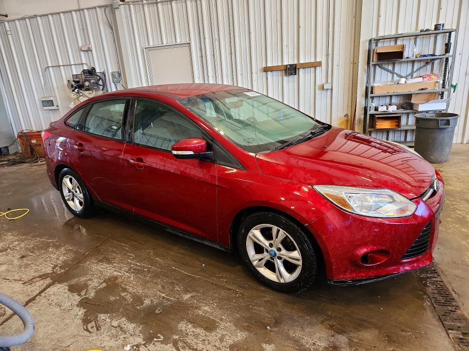 Photo 4 from auction – 2014 FORD FOCUS with VIN 1FADP3F24EL413588