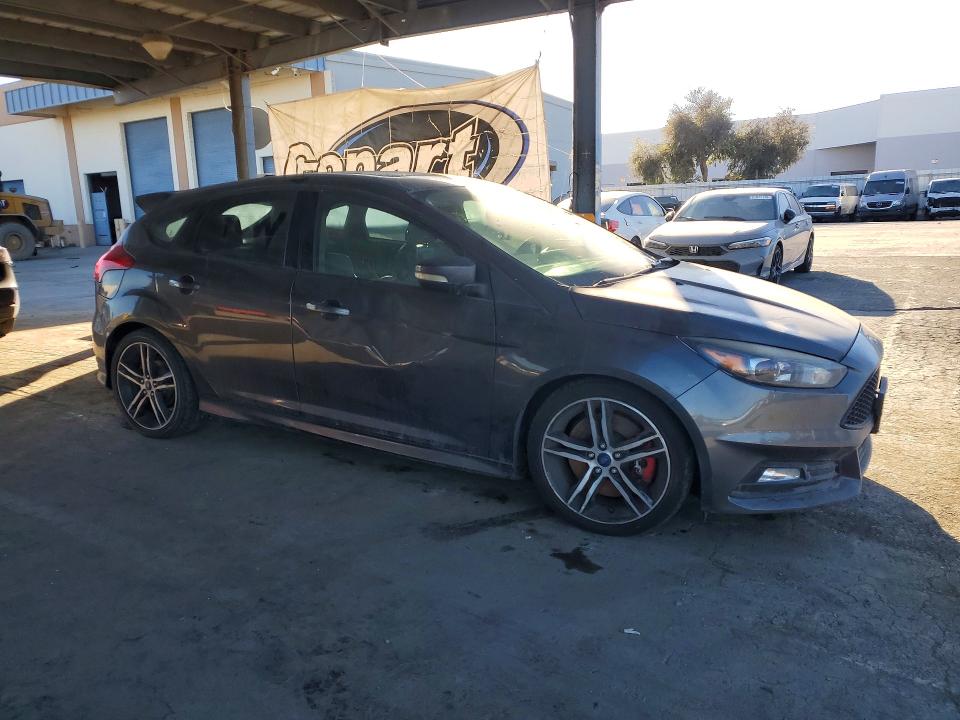 Снимка 4 от търг – 2016 FORD FOCUS с VIN 1FADP3L96GL324996