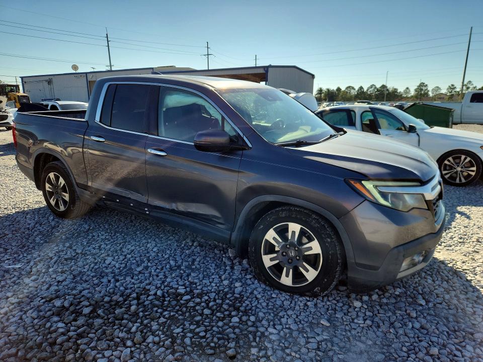 Photo 4 from auction – 2019 HONDA RIDGELINE with VIN 5FPYK3F71KB005027