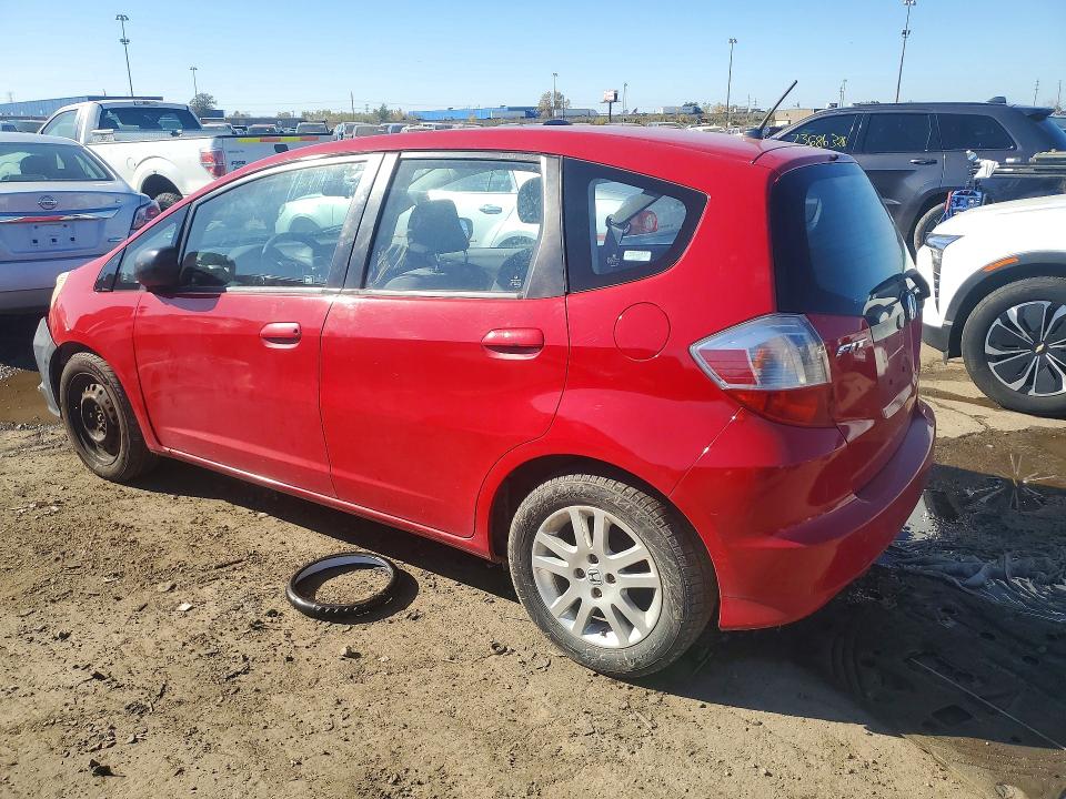 Снимка 2 от търг – 2009 HONDA FIT с VIN JHMGE88229S059796