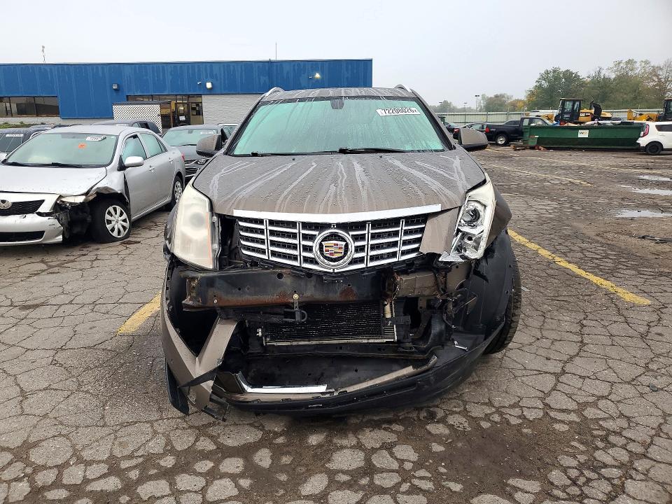 Photo 5 from auction – 2015 CADILLAC SRX with VIN 3GYFNBE3XFS534385