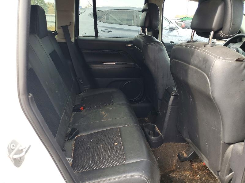 Photo 11 from auction – 2014 JEEP COMPASS with VIN 1C4NJDAB6ED840908