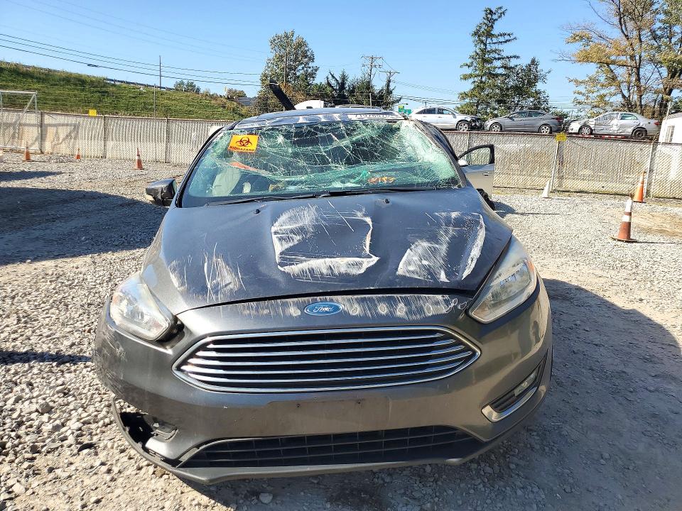 Photo 5 from auction – 2018 FORD FOCUS with VIN 1FADP3J22JL233480
