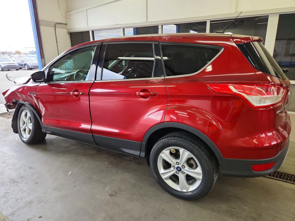 Photo 2 from auction – 2014 FORD ESCAPE with VIN 1FMCU9G92EUB01904