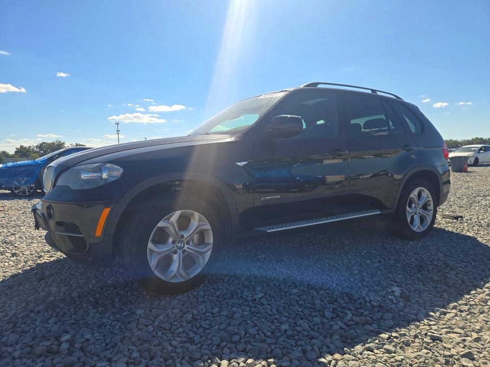 BMW X5 2013 с VIN 5UXZV8C59DL899569 - Снимка от търг