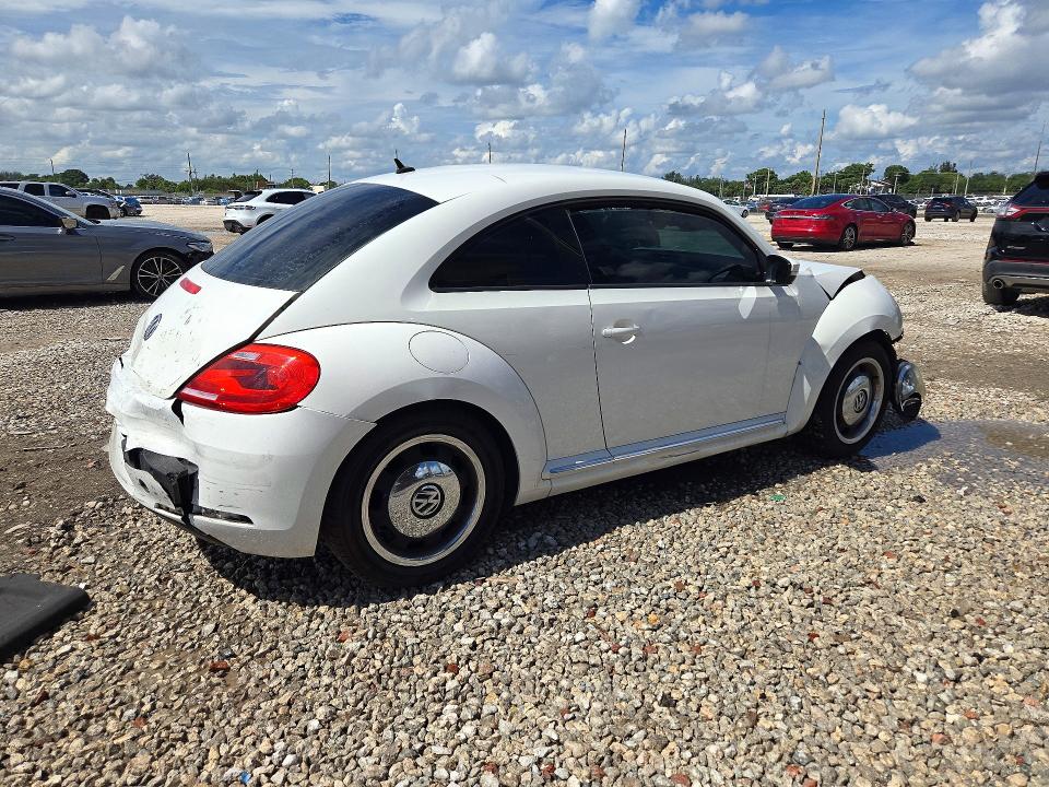 Снимка 3 от търг – 2012 VOLKSWAGEN BEETLE с VIN 3VWHP7ATXCM625441