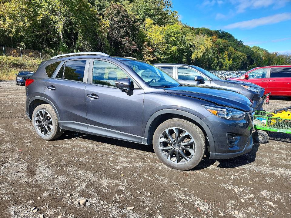 Photo 4 from auction – 2016 MAZDA CX-5 with VIN JM3KE4DY9G0705799