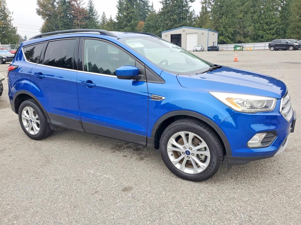 Снимка 4 от търг – 2018 FORD ESCAPE с VIN 1FMCU9HD5JUB44937